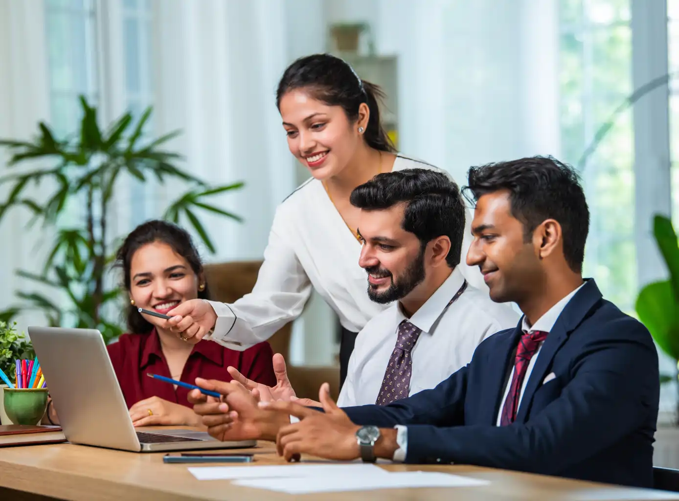 Team of diverse professionals working together in an inclusive environment at IndusInd Nippon Life