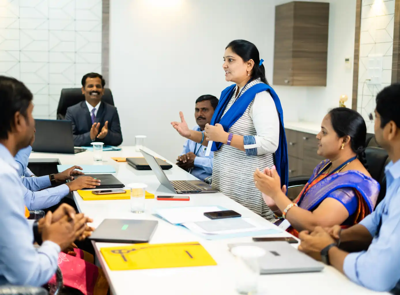 Diverse employees collaborating in an inclusive and supportive work environment at IndusInd Nippon Life